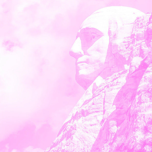 Mt. Rushmore with a pink and white cloud-like background